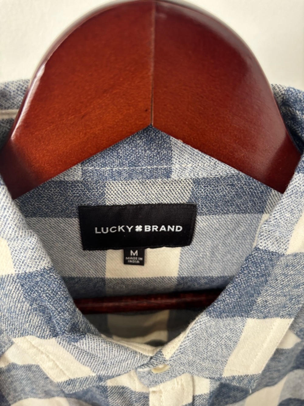 Lucky Brand Men’s Blue and White flannel with snap buttons.